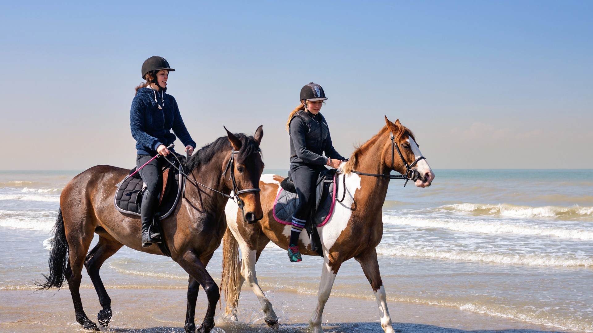 Paardrijden op het strand