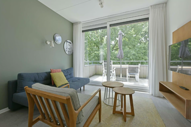 Dormio_Resort_Maastricht_Appartement_Kopersmid_15K_Livingroom_001.png