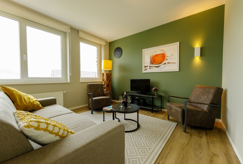 Dormio_Resort_Eifeler_Tor_Apartment_Fleesensee_Living_Room_001.jpg