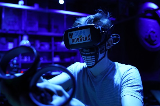 Play the VR laser game with children or adults